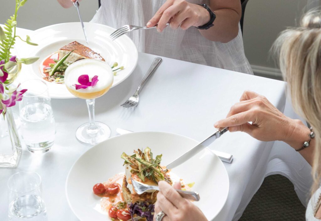 People dining at a restaurant table