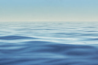 Photorealistic painting of sea waves and ripples