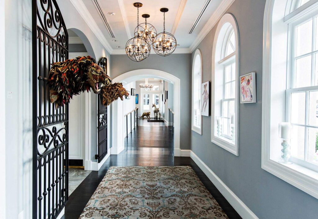 Brightly lit hallway with hanging artwork