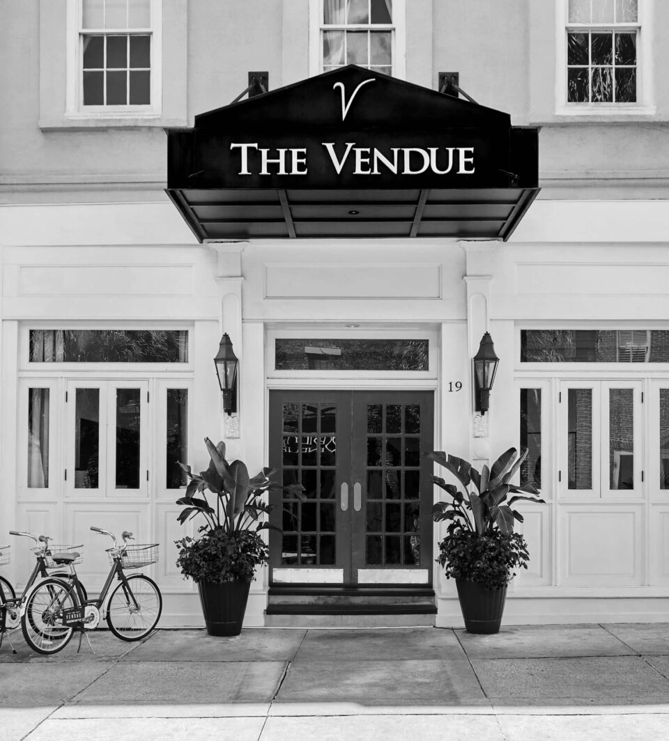 exterior black and white photo of The Vendue Hotel